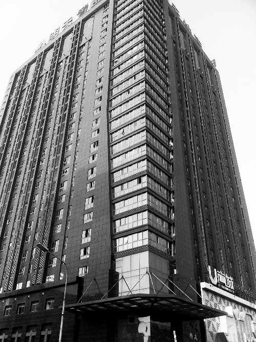 記者按照公開地址在鄭州一處寫字樓尋找一家軟件公司，一無所獲。