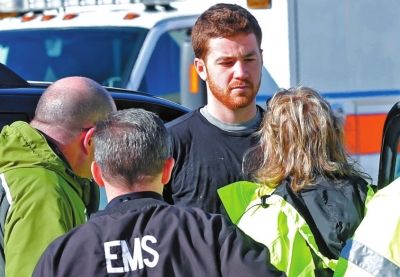 嫌犯接受詢問。新華社/美聯(lián)