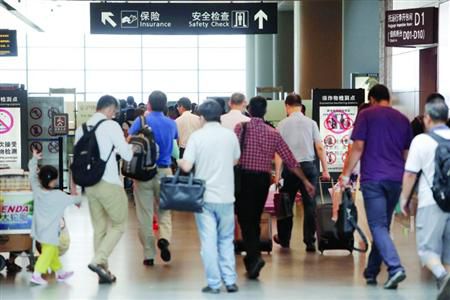 近期乘飛機應(yīng)留足更多的時間以免誤機。/晨報記者 殷立勤