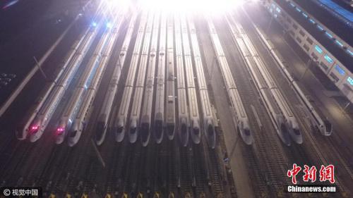 資料圖：高鐵“萬箭齊發(fā)”勢如“陸地航母”。 圖片來源：視覺中國
