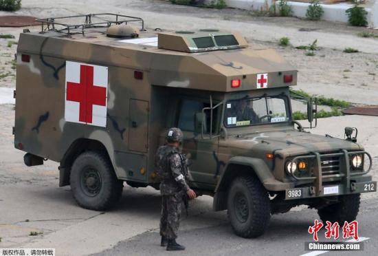 資料圖：當(dāng)?shù)貢r(shí)間2014年6月23日，韓國江原道哨所槍擊事件肇事士兵林某已被抓獲